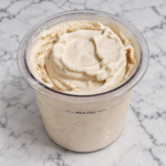 Banana Ninja Creami without protein powder in a pint container, showing its smooth and creamy texture.