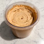 High-Protein Peanut Butter Pudding Ninja Creami in a pint container