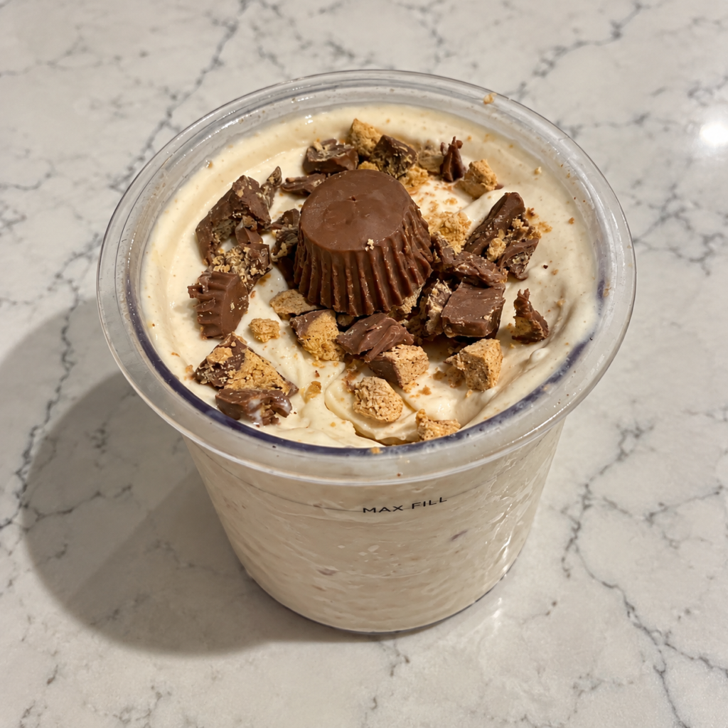 High-Protein Reese’s Peanut Butter Ninja Creami topped with Reese’s Miniatures