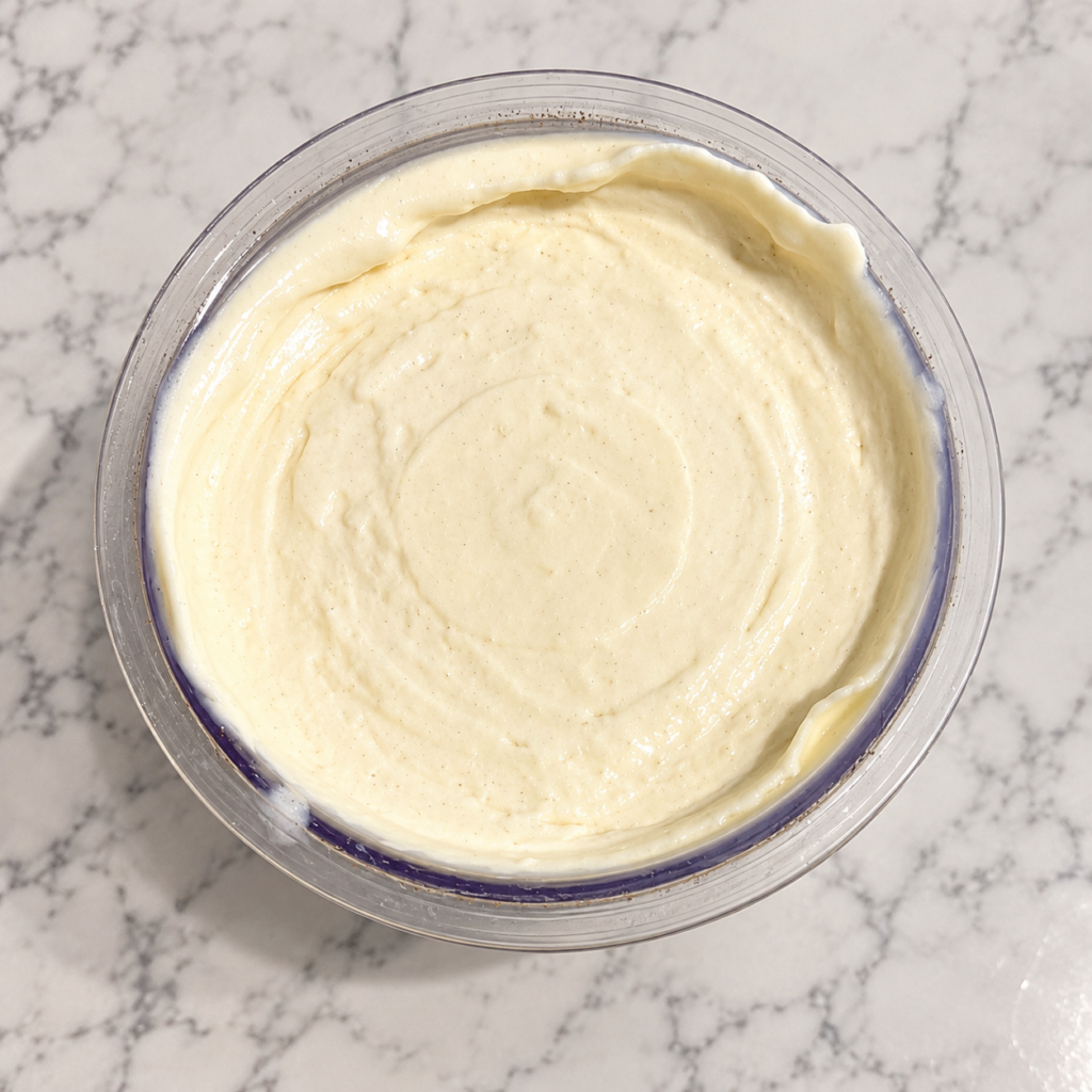 Top-down view of High-Protein Vanilla Pudding Ninja Creami showing its smooth, creamy texture