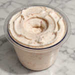 Strawberry Cheesecake Ninja Creami made without protein powder in a Ninja Creami pint.