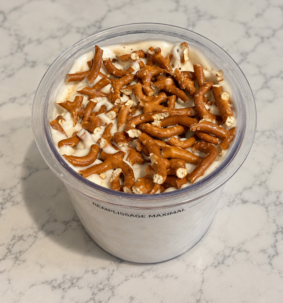 Caramel Macchiato Ninja Creami topped with 20 grams of crushed Rold Gold Tiny Twists Pretzels