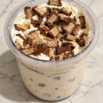 Kit Kat McFlurry Ninja Creami topped with chopped chocolate-covered wafer pieces